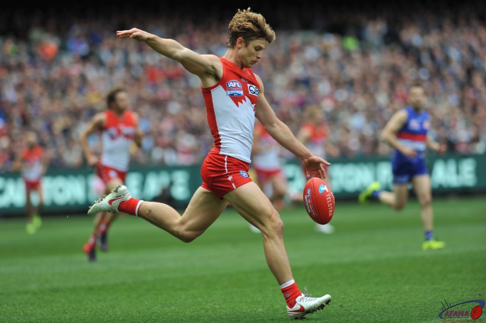 Rampe clears from the Swans backline