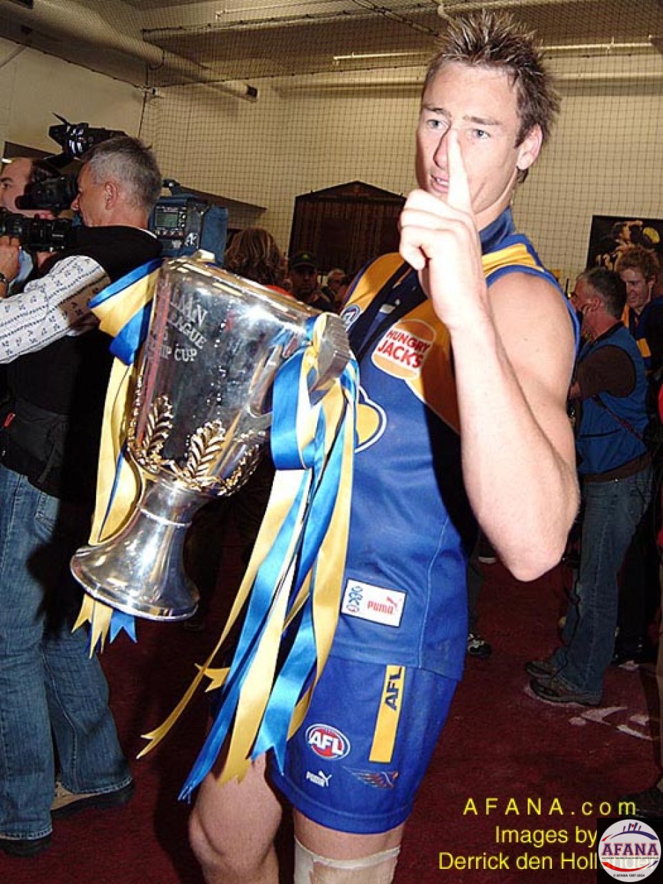 [b]The spils of victory, the treasured Premiers Cup and the no.1 salute[/b]