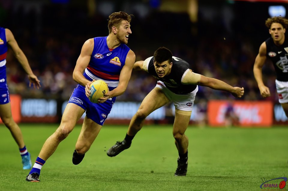 The Bont turns Kennedy inside out , turns and drives the ball forward.