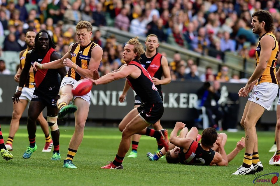 Sicily kick clear as Darcy Parish attempts to spoil. 